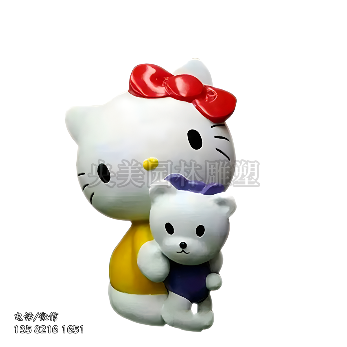 抱著一個小熊的kitty貓雕塑